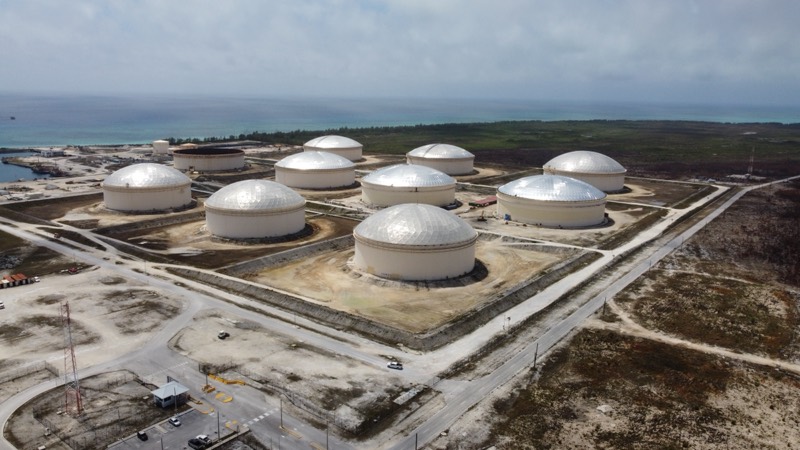 Domed storage tanks at Liwathon B.O.S., seen from the air above the terminal gate.