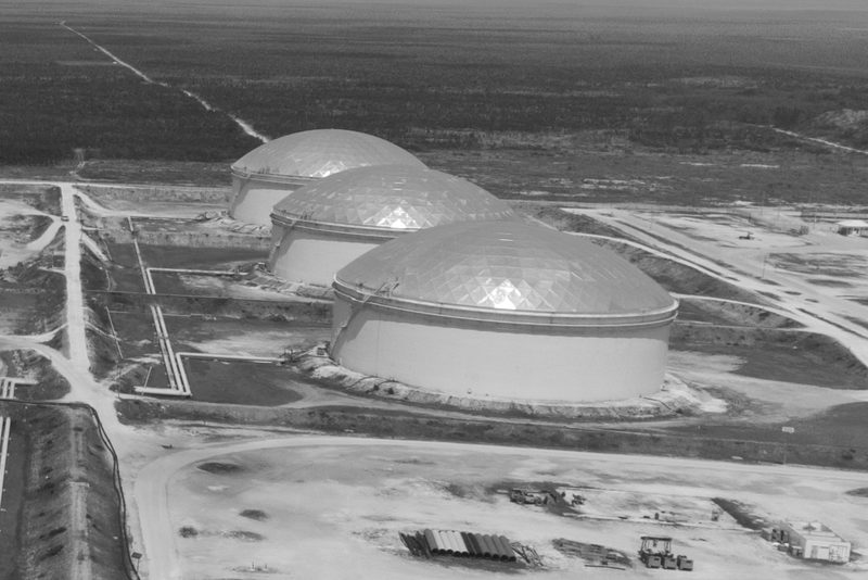 Domed storage tanks at Liwathon B.O.S., each in its own bunded cell, seen from the air.